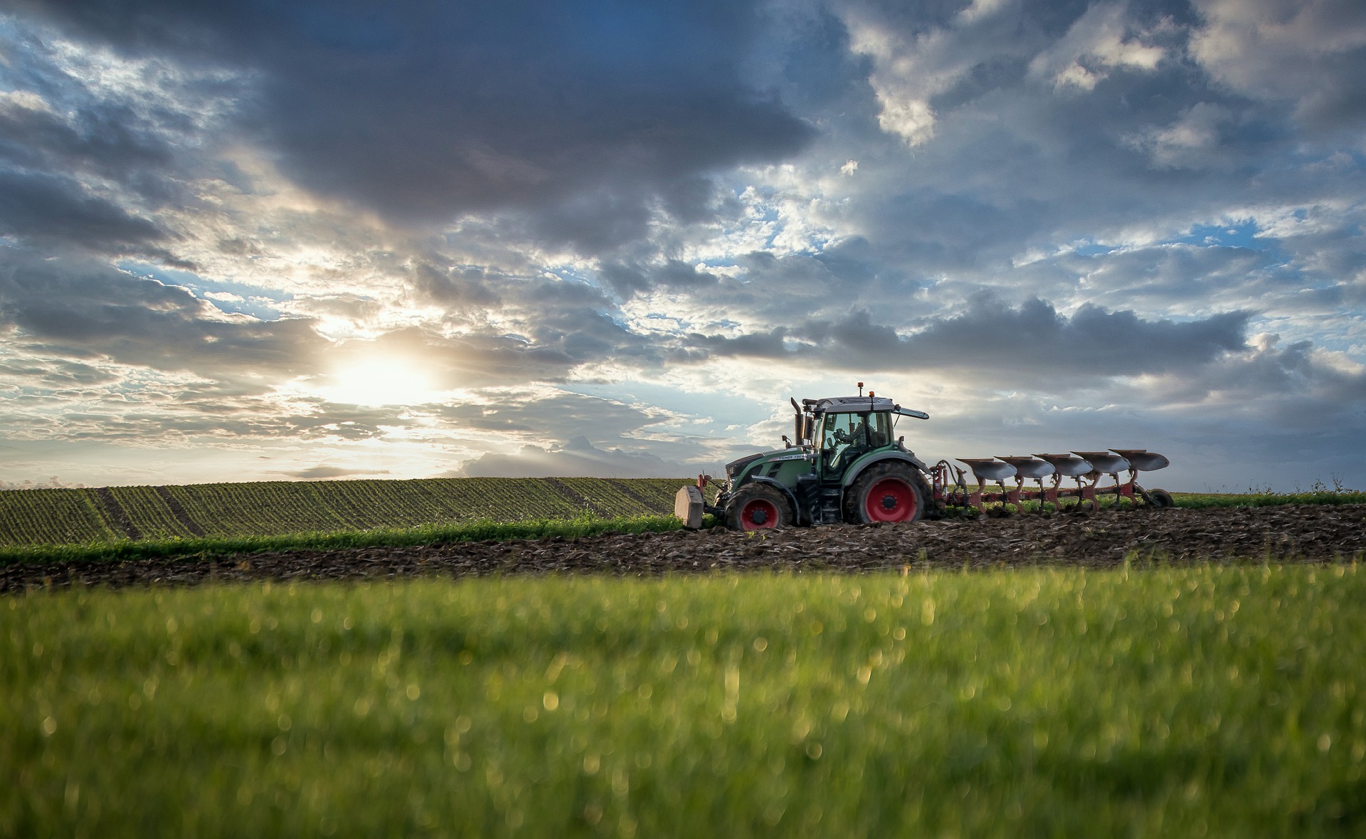Tractor ploughing in an agricultural field